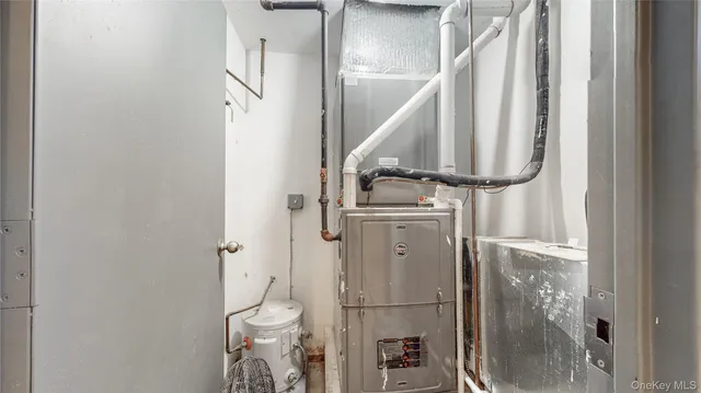 a bathroom with a granite countertop shower and a toilet