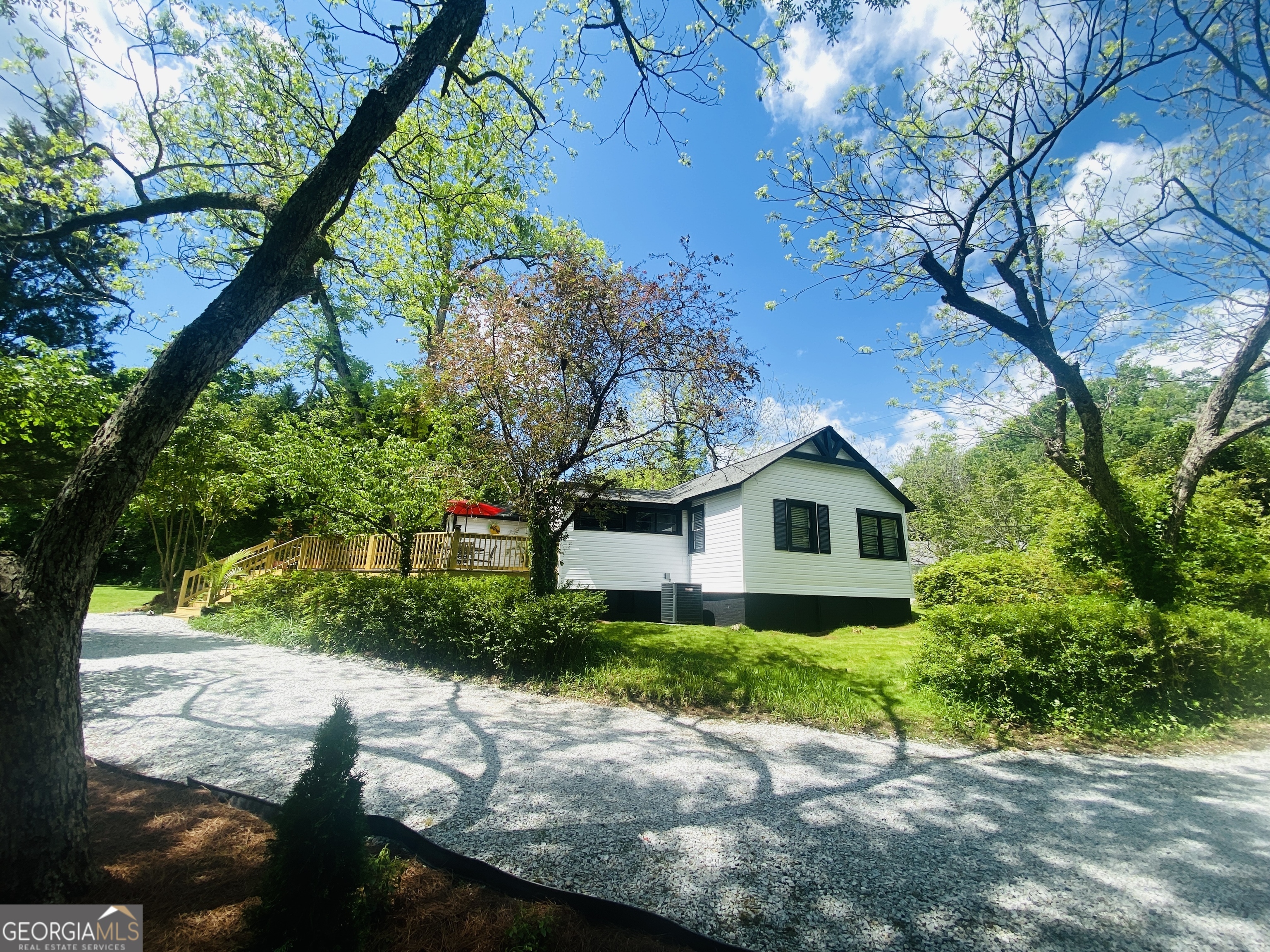 104 Nassau Place Toccoa, GA 30577 - Photo 1 of 1 a view of a garden with a patio