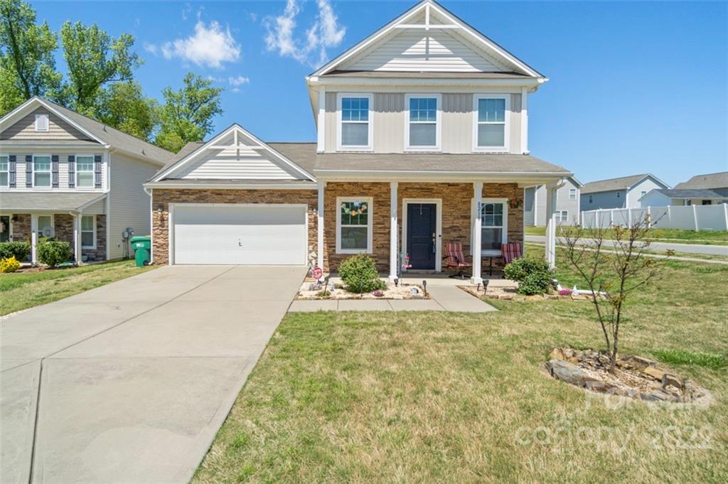 front view of a house with a yard