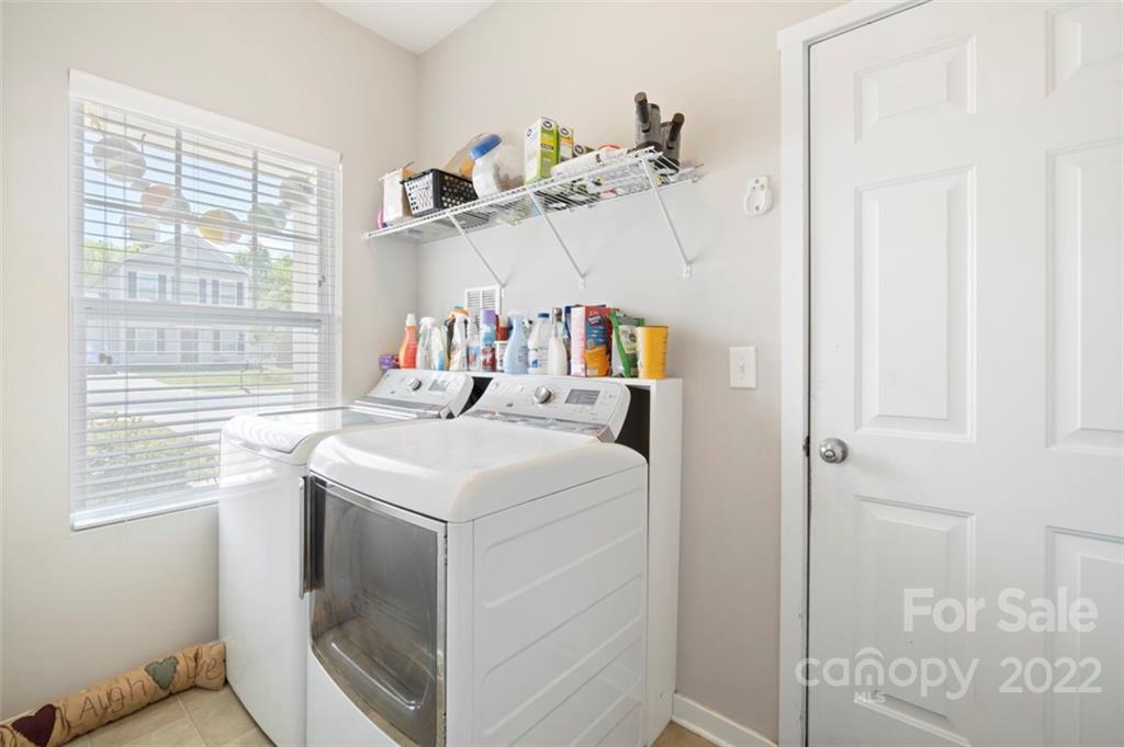 8218 Midas Lane Locust, NC 28097 - Photo 28 of 34 a utility room with dryer and washer