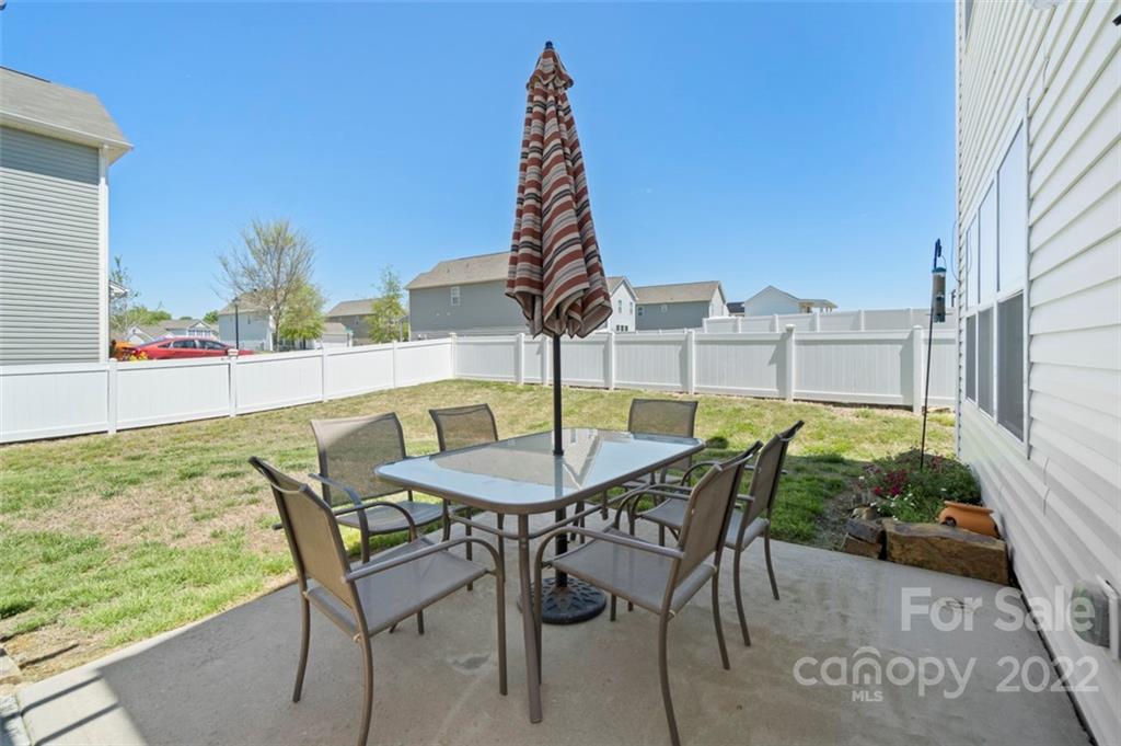 8218 Midas Lane Locust, NC 28097 - Photo 29 of 34 a view of a outdoor space with a table and chairs