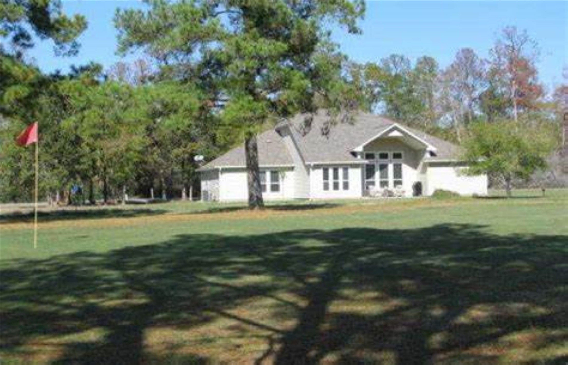 L29 Spreading Oak Trinity, TX 75862 - Photo 14 of 25 a view of a house with a big yard