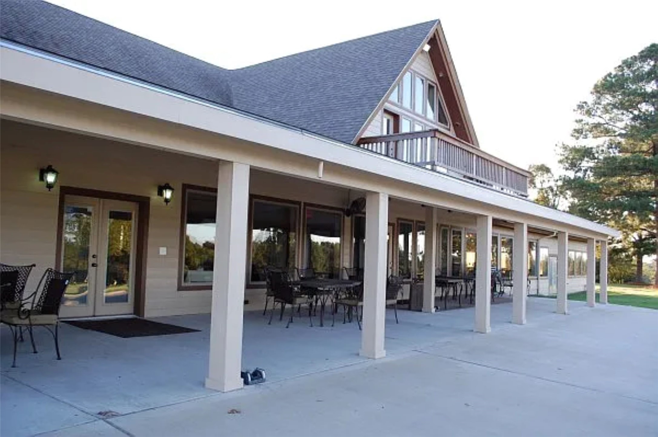 L29 Spreading Oak Trinity, TX 75862 - Photo 24 of 25 a view of a patio with dining table and chairs