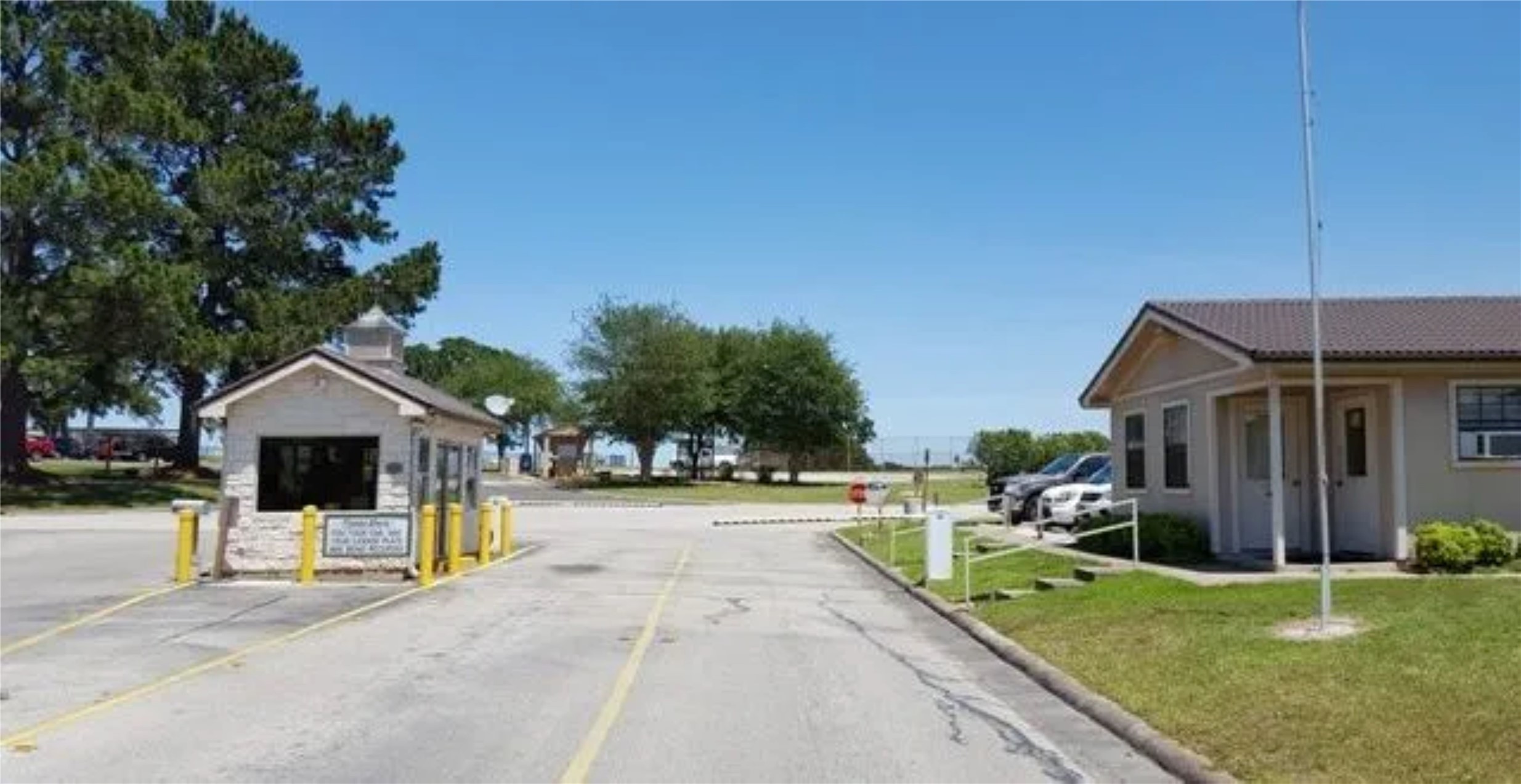 L29 Spreading Oak Trinity, TX 75862 - Photo 25 of 25 a view of a house with backyard and sitting area
