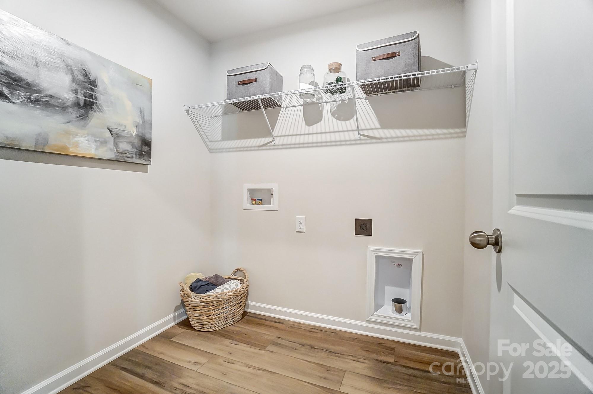 311 Laura Elizabeth Lane Clover, SC 29710 - Photo 30 of 39 a room with a wooden floor and white walls