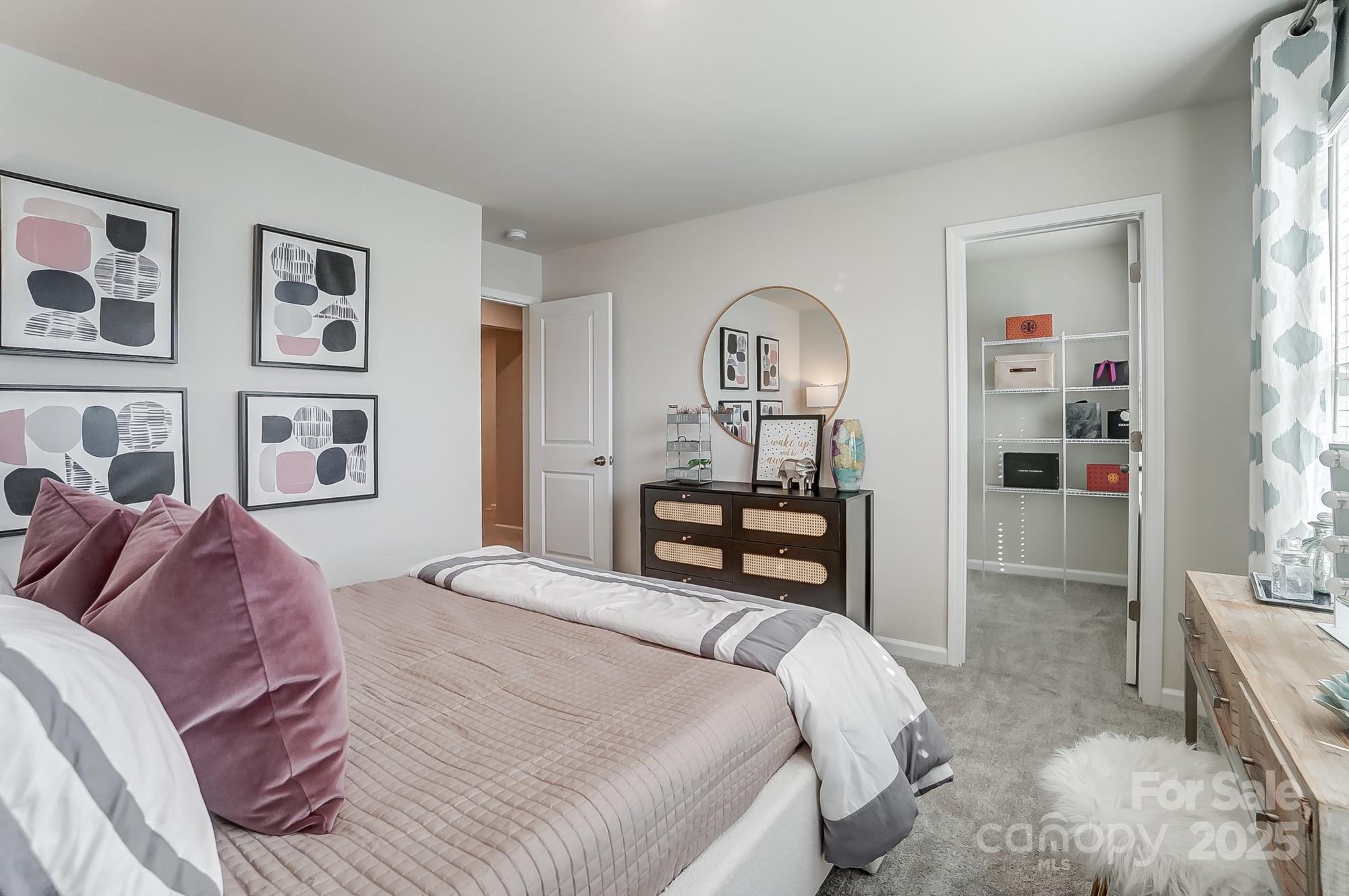 311 Laura Elizabeth Lane Clover, SC 29710 - Photo 34 of 39 a bedroom with a bed and a cabinets