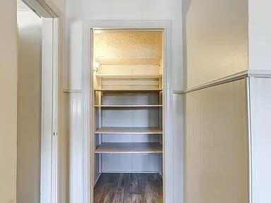 2716 29th Street Lubbock, TX 79410 - Photo 16 of 27 a view of walk in closet with empty racks