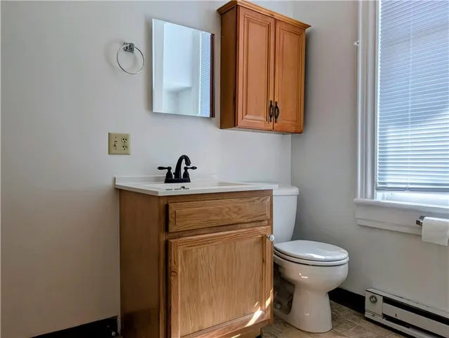 a bathroom with a bath tub with a shower
