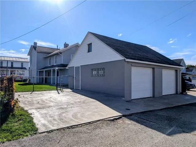 a house view with a backyard space