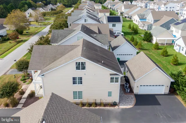 a view of a chair and tables in the balcony