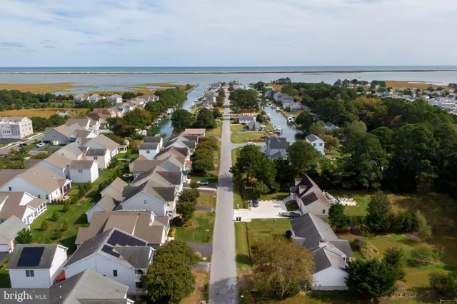 a view of swimming pool with seating space