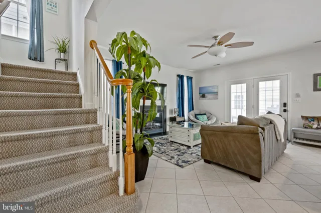 a kitchen with a sink stove top oven and wooden cabinets