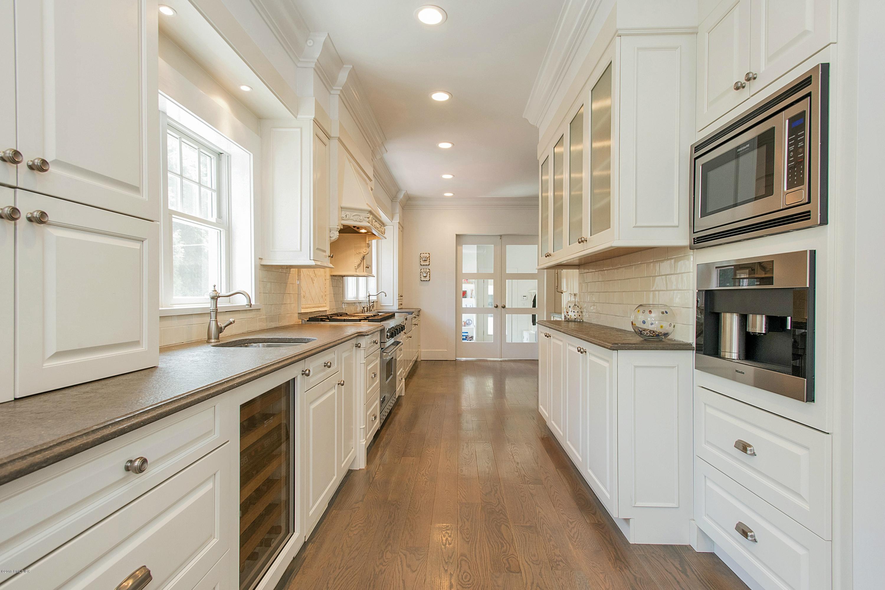 246 Riverside Avenue Riverside, CT 06878 - Photo 12 of 36 a large kitchen with stainless steel appliances lots of counter space and a sink