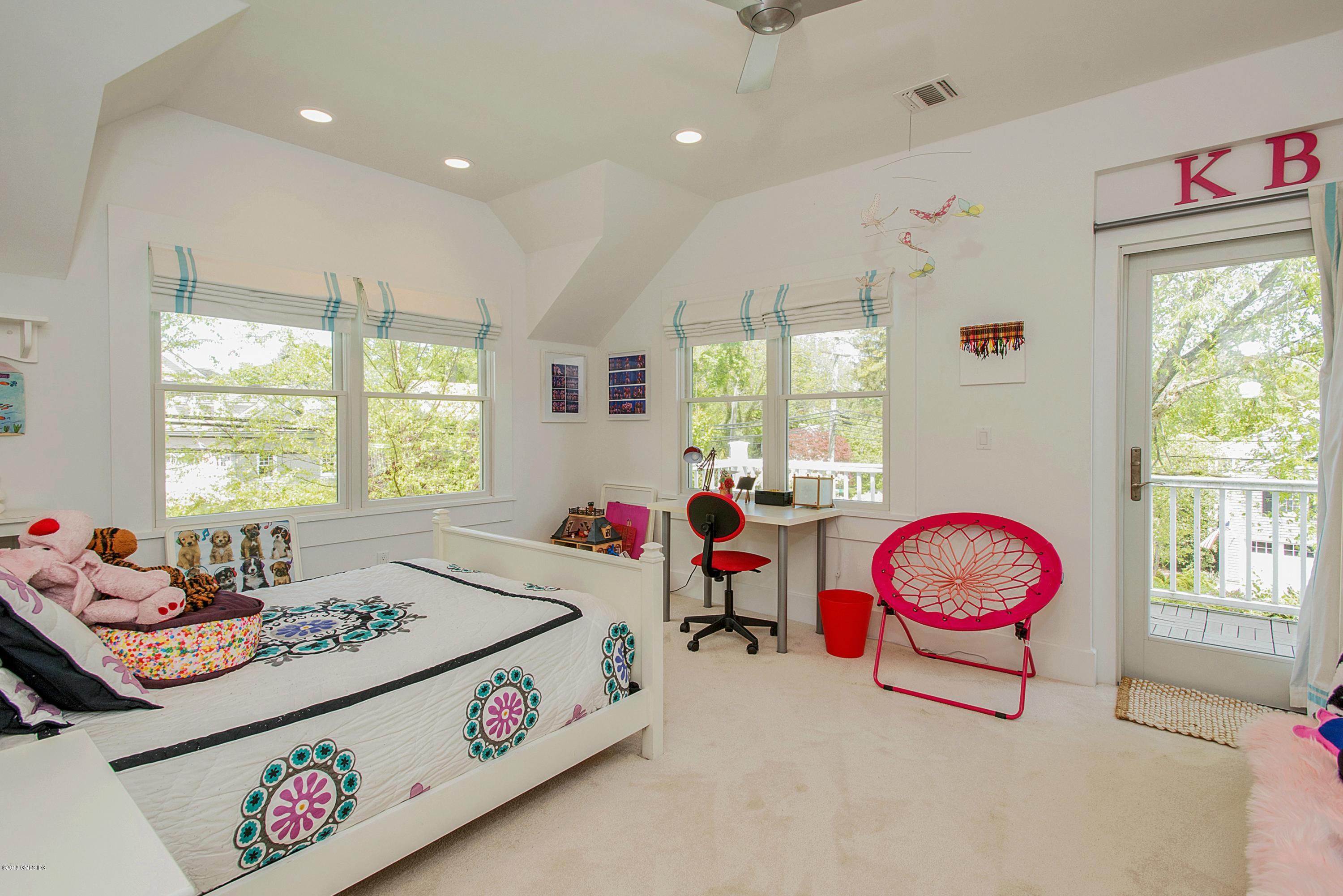 246 Riverside Avenue Riverside, CT 06878 - Photo 21 of 36 a living room with furniture and a window