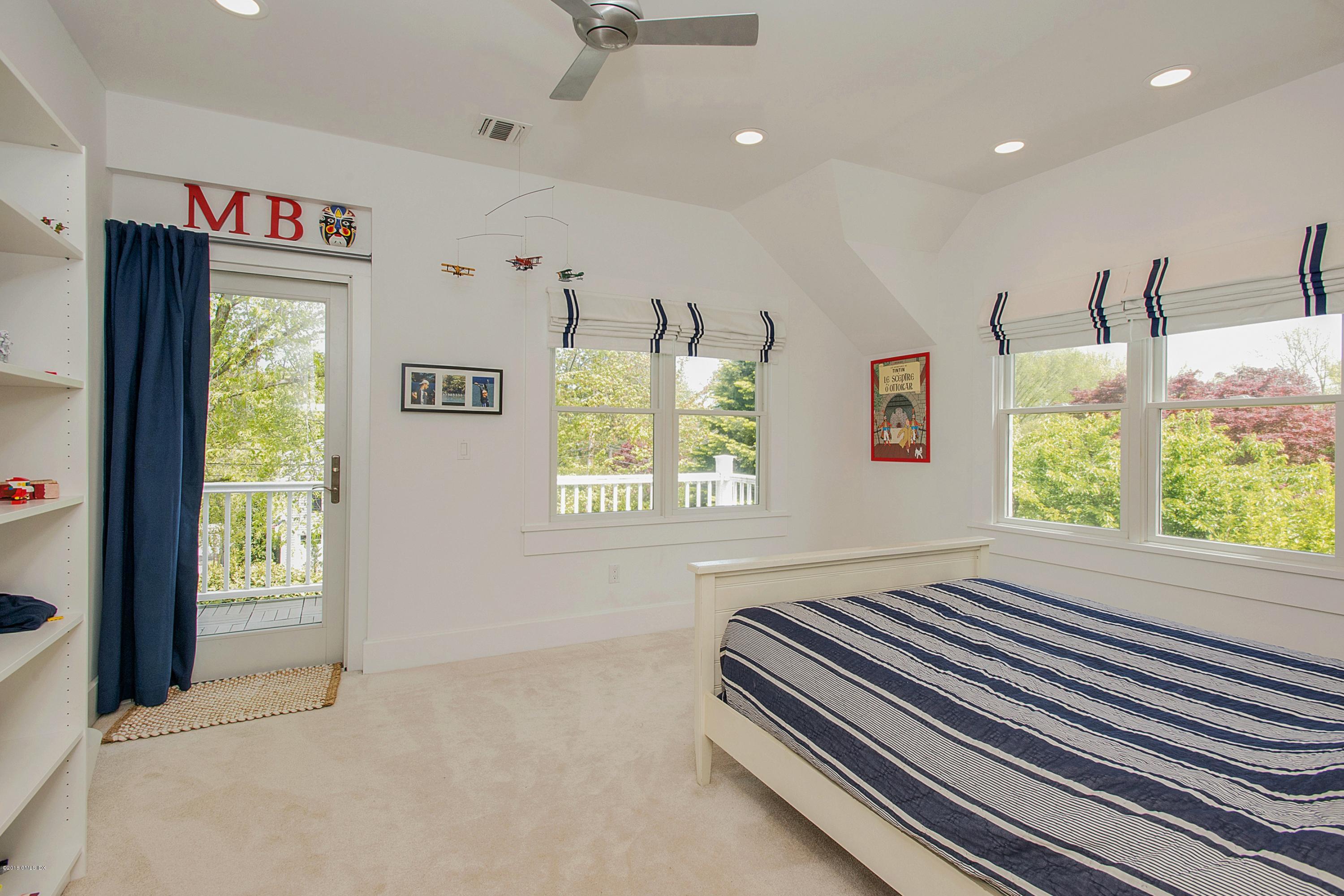 246 Riverside Avenue Riverside, CT 06878 - Photo 23 of 36 a view of an empty room with a window