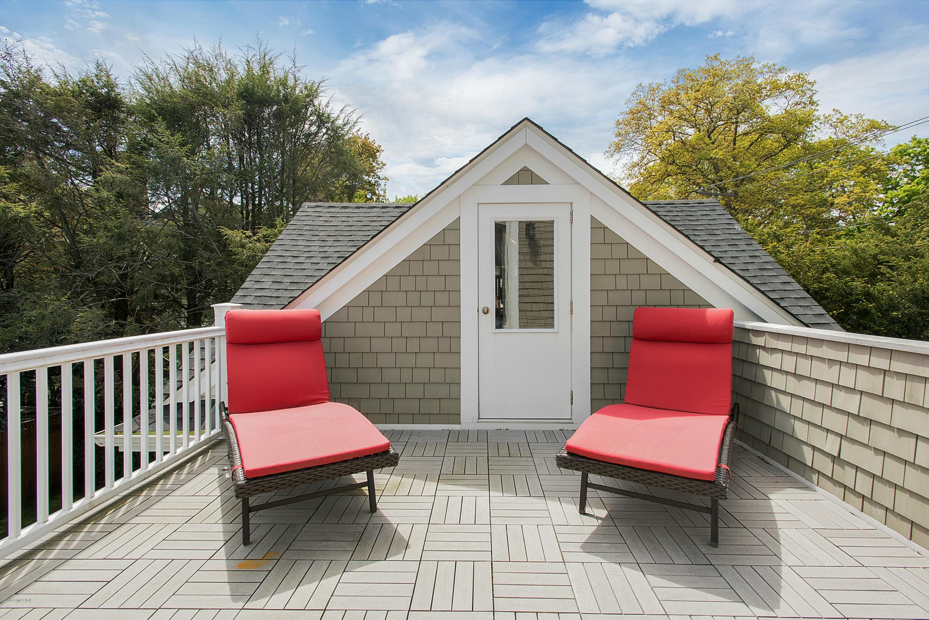 246 Riverside Avenue Riverside, CT 06878 - Photo 25 of 36 a view of a chairs in wooden deck