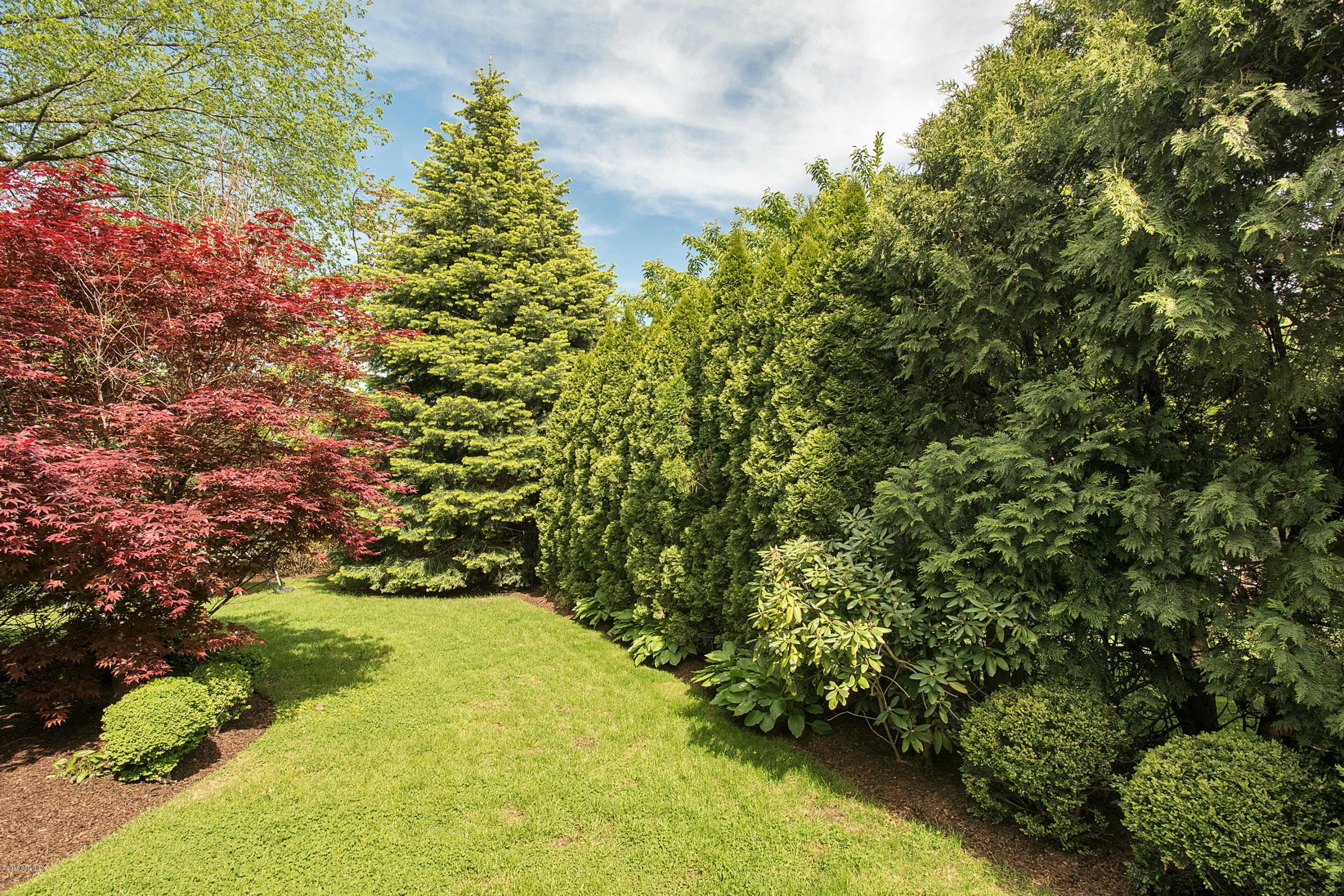 246 Riverside Avenue Riverside, CT 06878 - Photo 33 of 36 a view of a garden