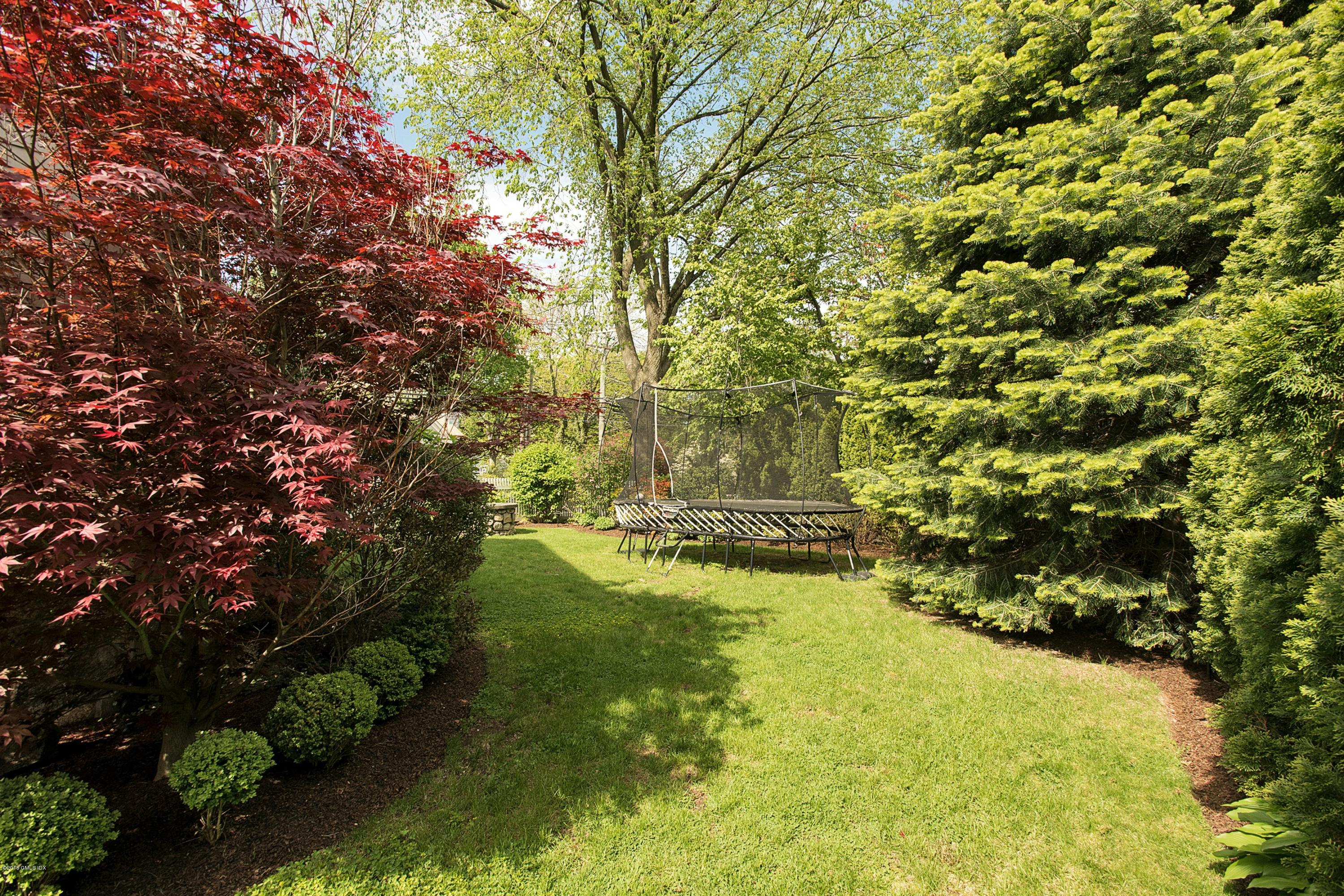 246 Riverside Avenue Riverside, CT 06878 - Photo 34 of 36 a view of yard with green space