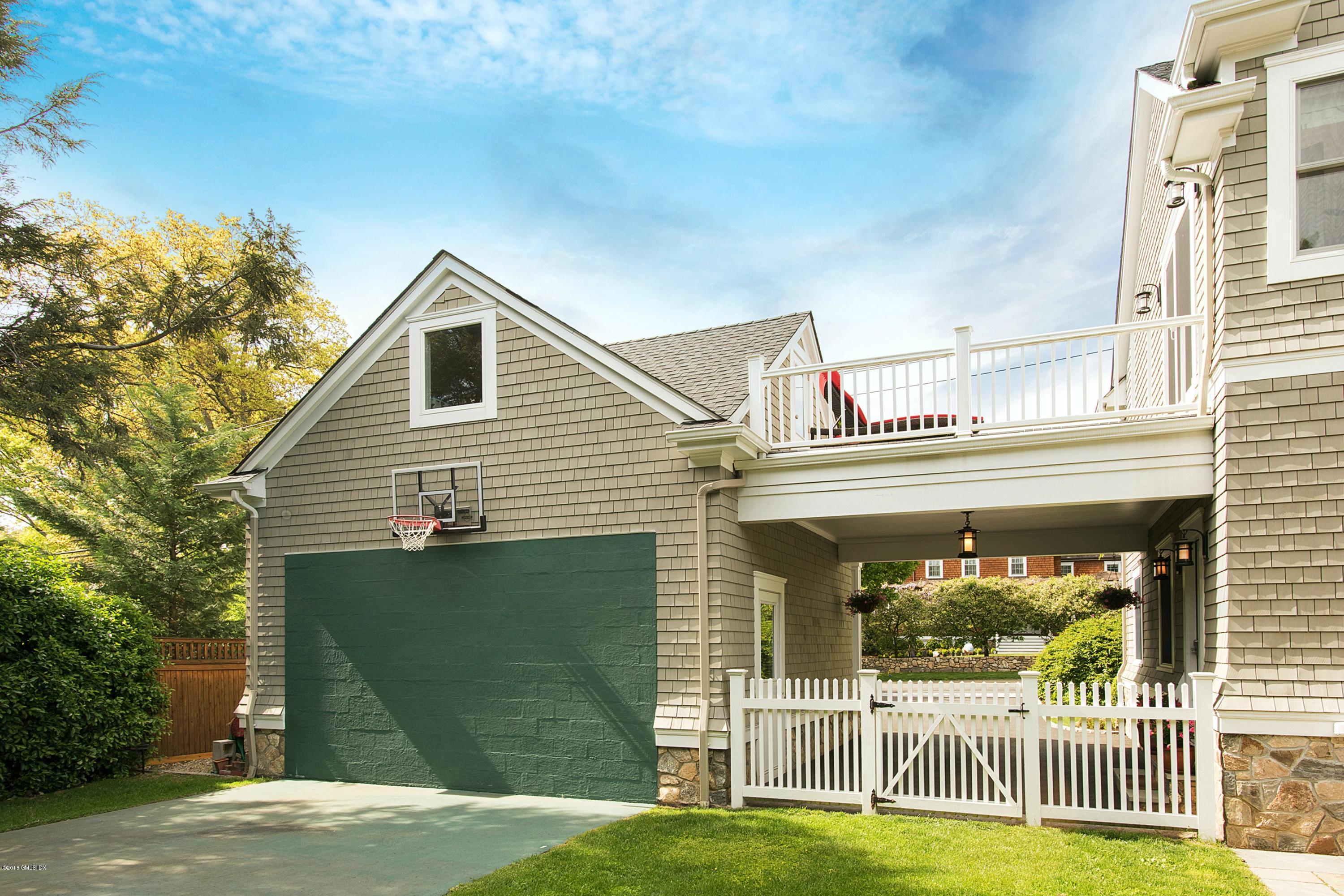 246 Riverside Avenue Riverside, CT 06878 - Photo 35 of 36 front view of a house with a yard