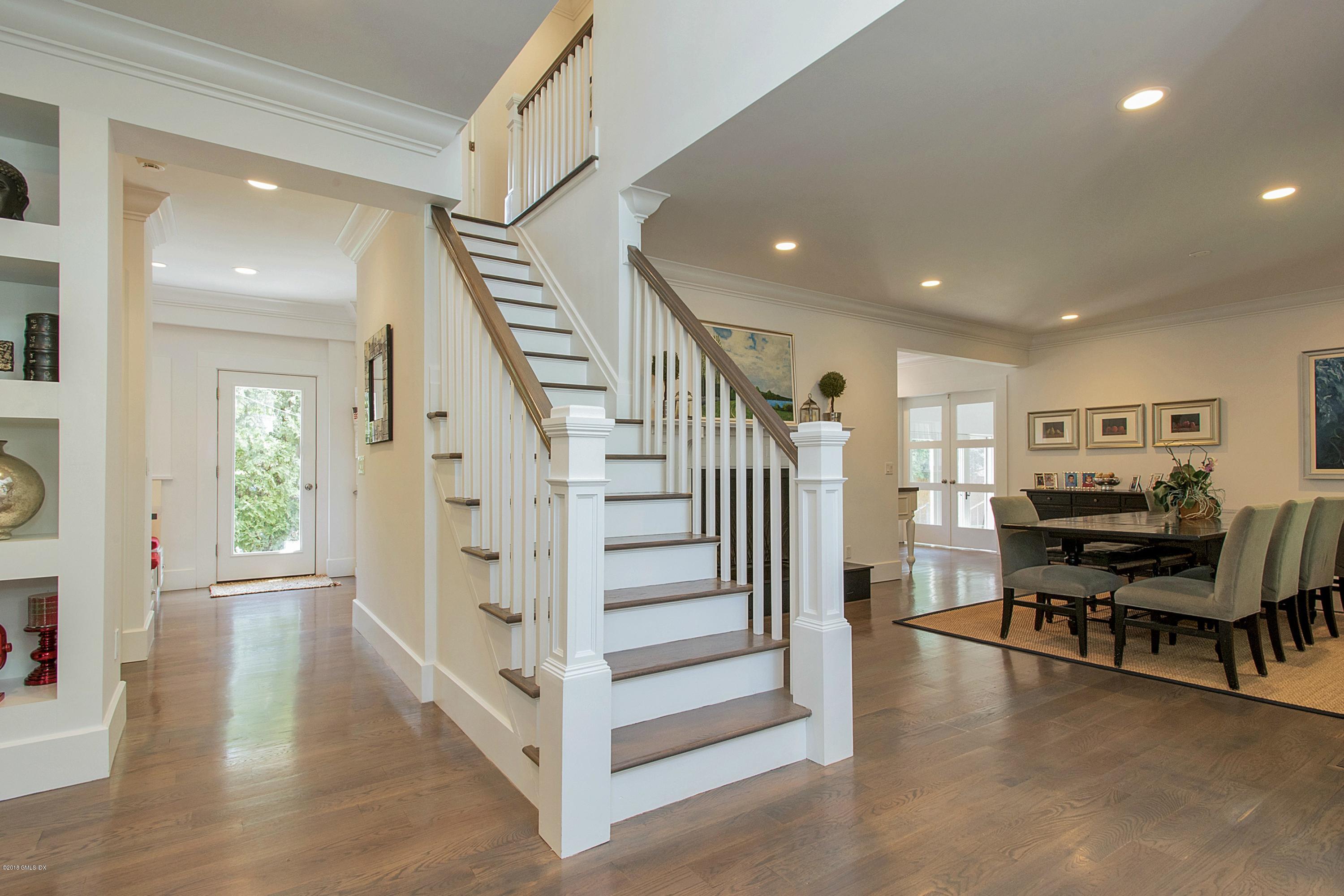 246 Riverside Avenue Riverside, CT 06878 - Photo 4 of 36 a view of a livingroom with furniture and staircase