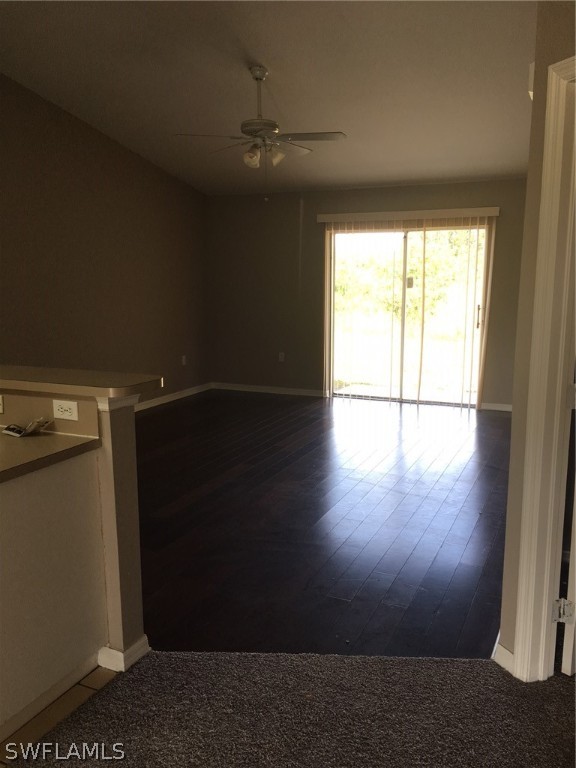789 Alabama Road South Lehigh Acres, FL 33974 - Photo 21 of 30 a view of empty room with wooden floor