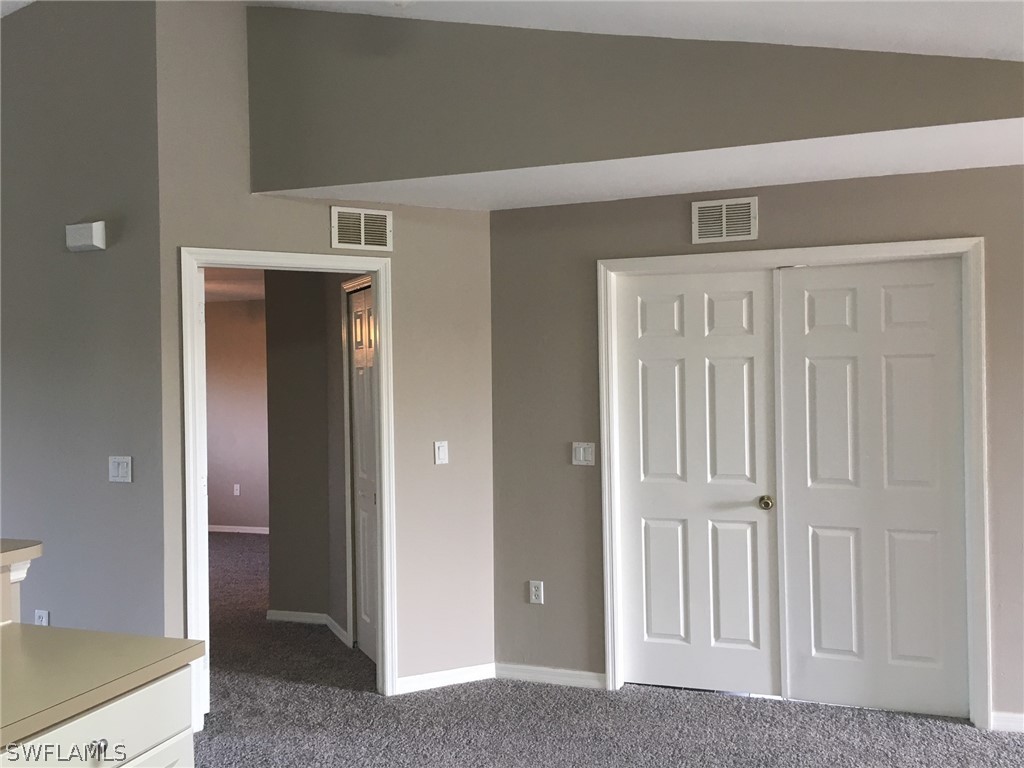 789 Alabama Road South Lehigh Acres, FL 33974 - Photo 22 of 30 a view of a livingroom with entryway