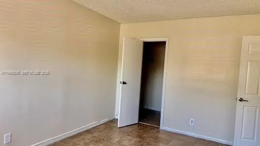a bathroom with a sink toilet and a mirror