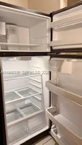 a view of a room with rack on the wall