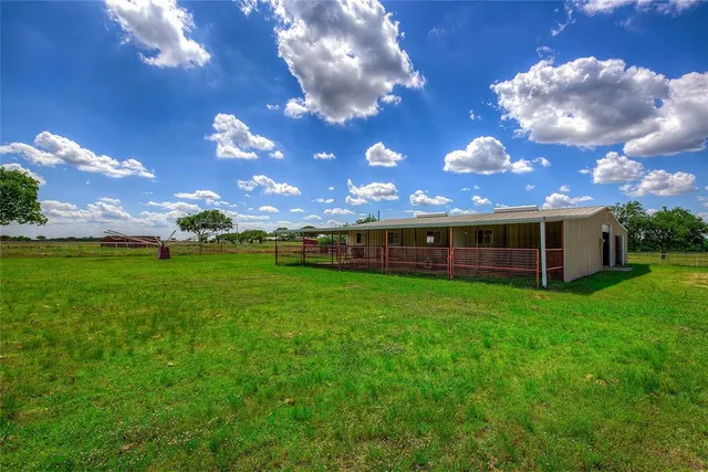 a view of a backyard with a garden