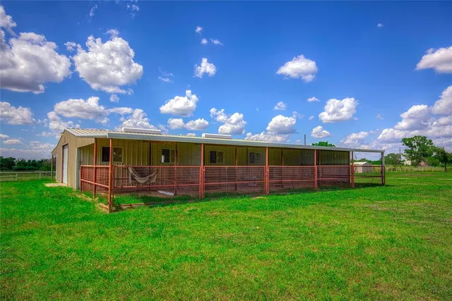 a view of a backyard with a garden
