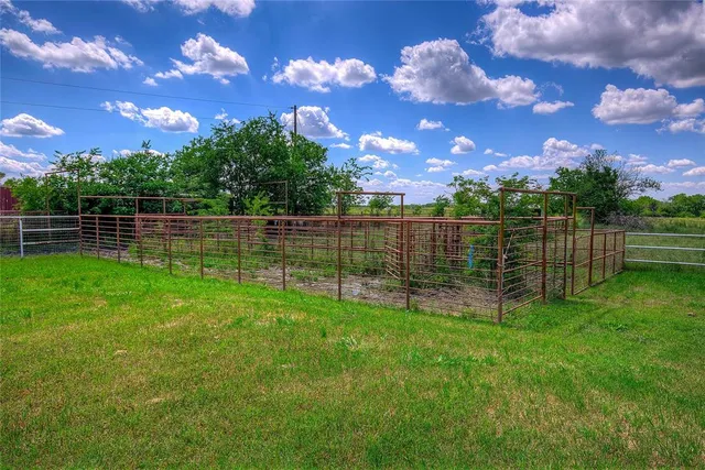 a view of a lake and a yard