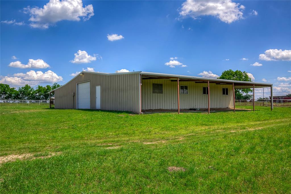 10000 County Road 357 Terrell, TX 75161 - Photo 5 of 38 a view of a house with a backyard