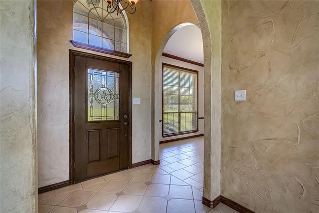 a view of a livingroom with a staircase