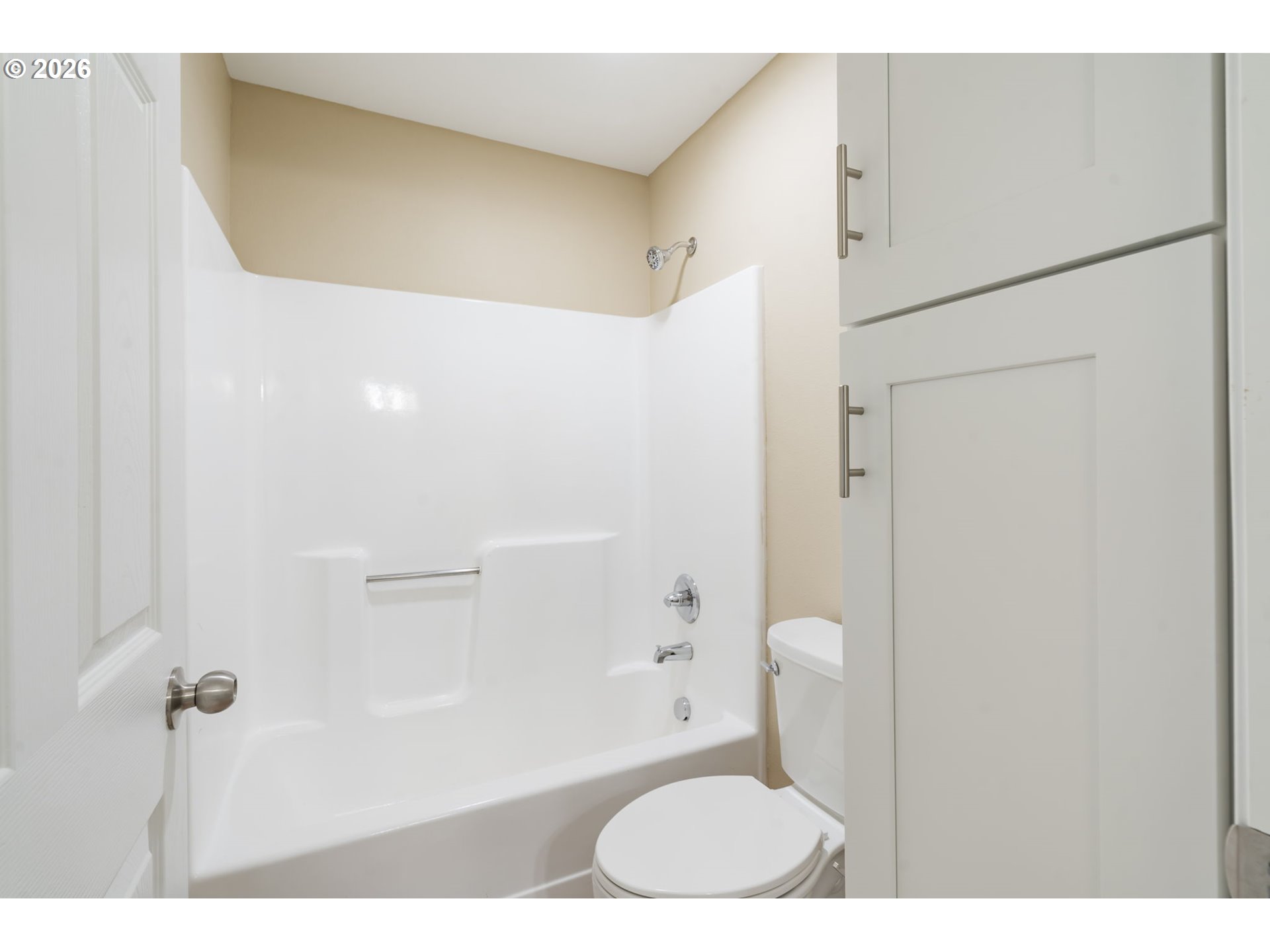 9967 Southeast Talbert Street Clackamas, OR 97015 - Photo 27 of 33 a bathroom with a toilet and shower