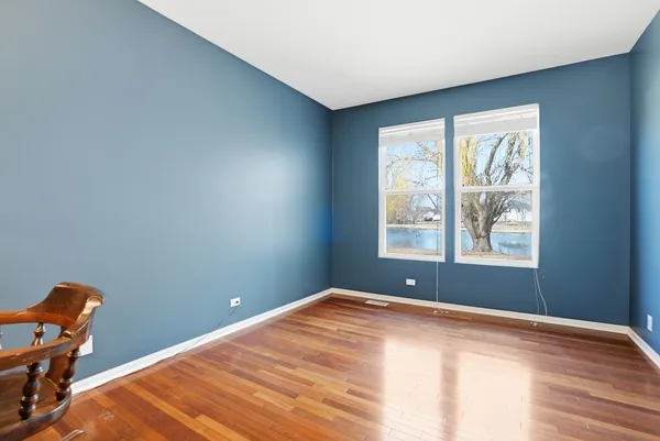 a view of a big room with windows