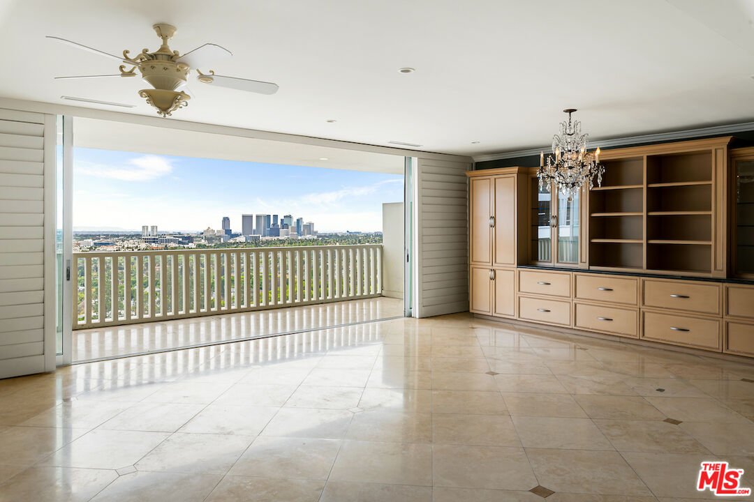 9255 Doheny Road, Unit 1104 West Hollywood, CA 90069 - Photo 1 of 28 a view of an empty room with a balcony