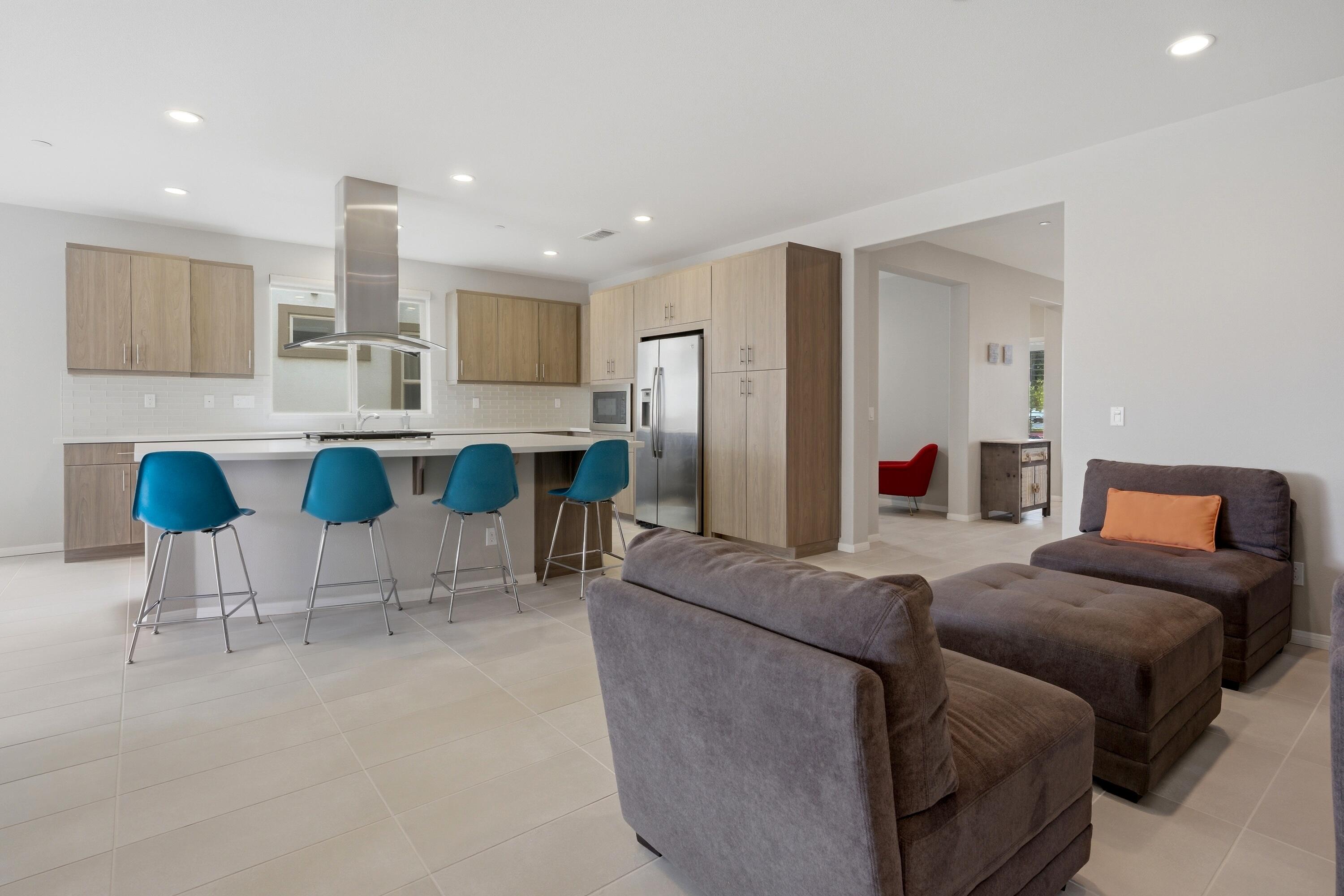 51370 North Two Palms Way Indio, CA 92201 - Photo 18 of 37 a living room with furniture and a view of kitchen