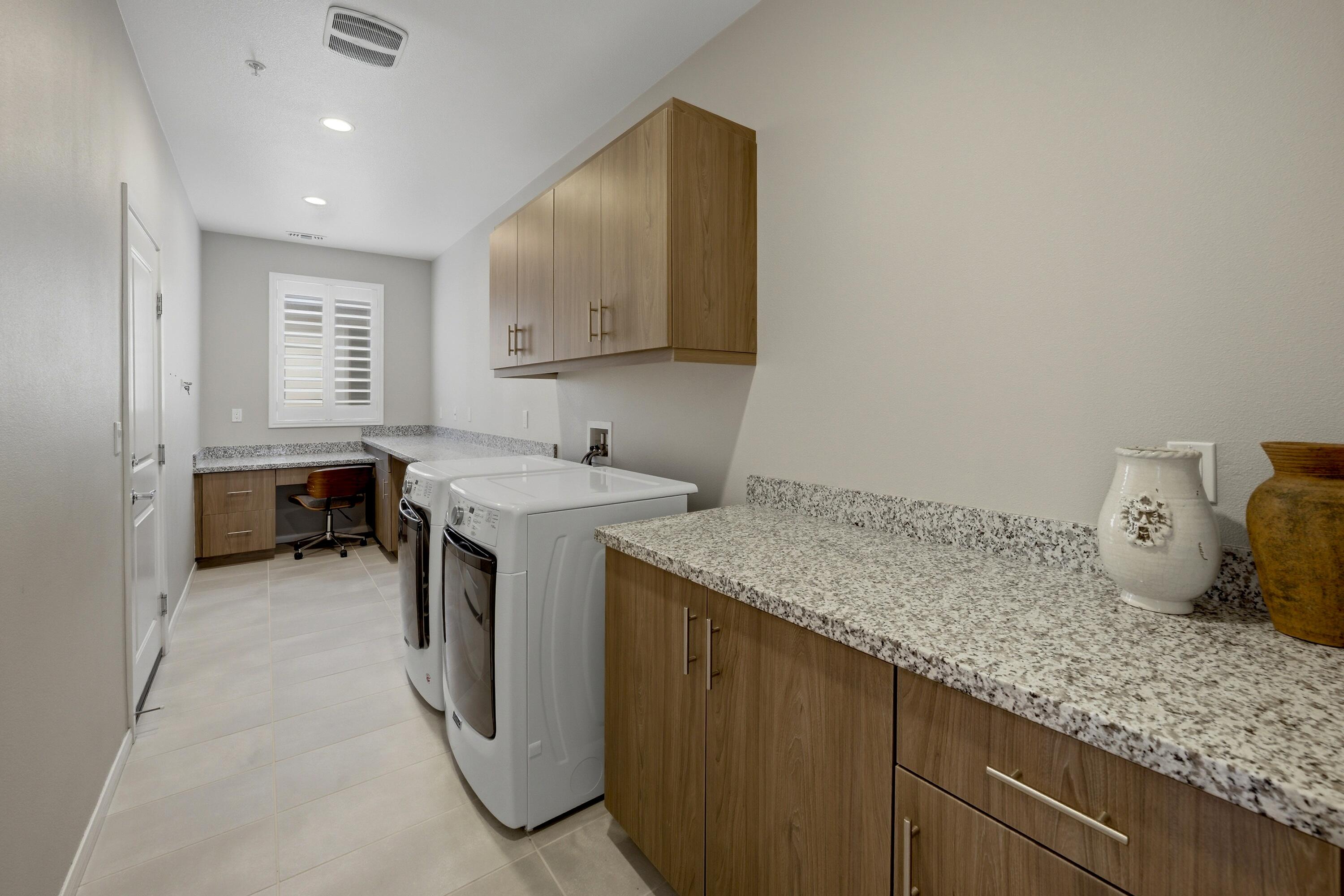 51370 North Two Palms Way Indio, CA 92201 - Photo 23 of 37 a utility room with sink dryer and washer