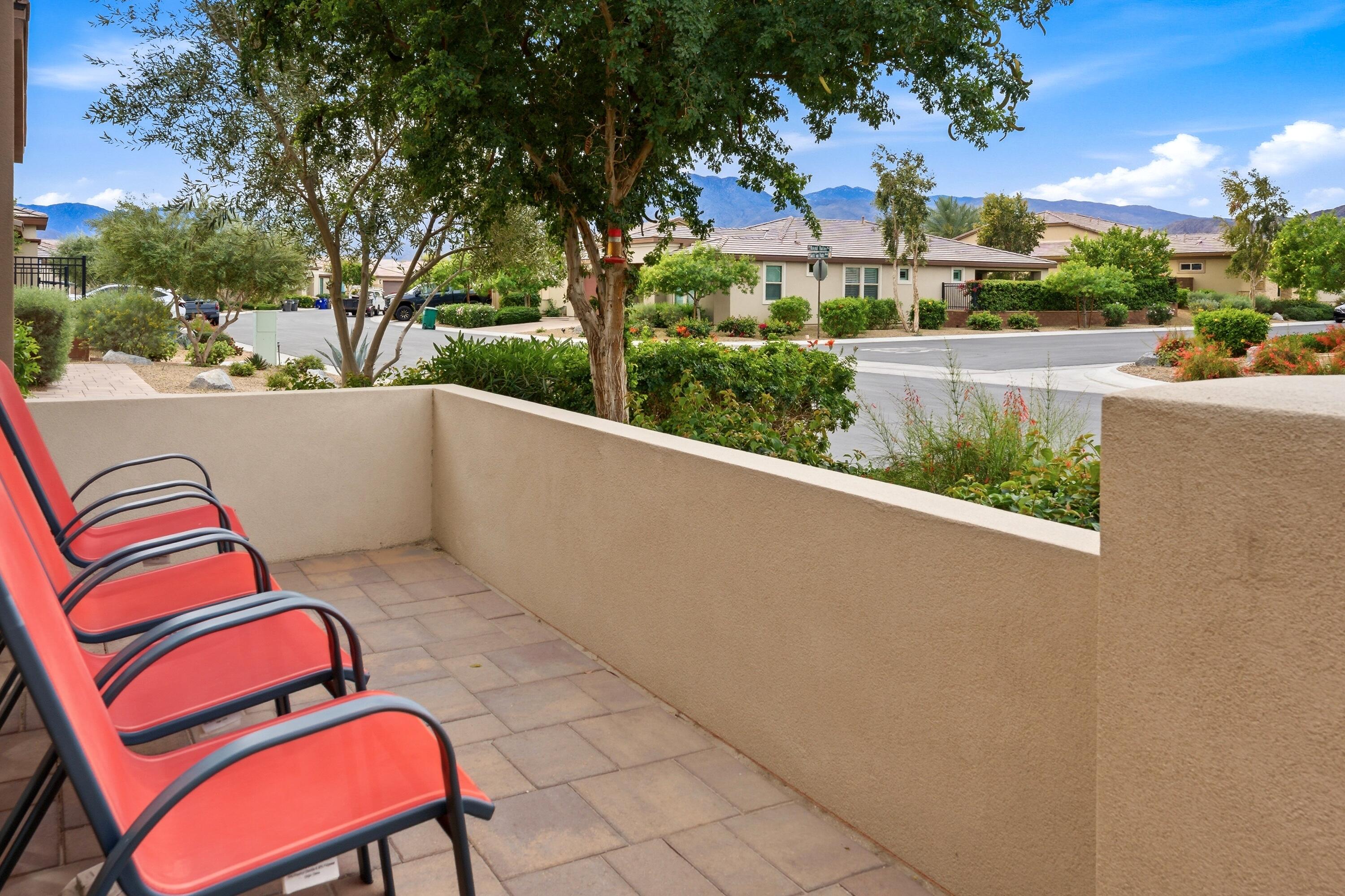 51370 North Two Palms Way Indio, CA 92201 - Photo 3 of 37 a view of a swimming pool with a lounge chairs