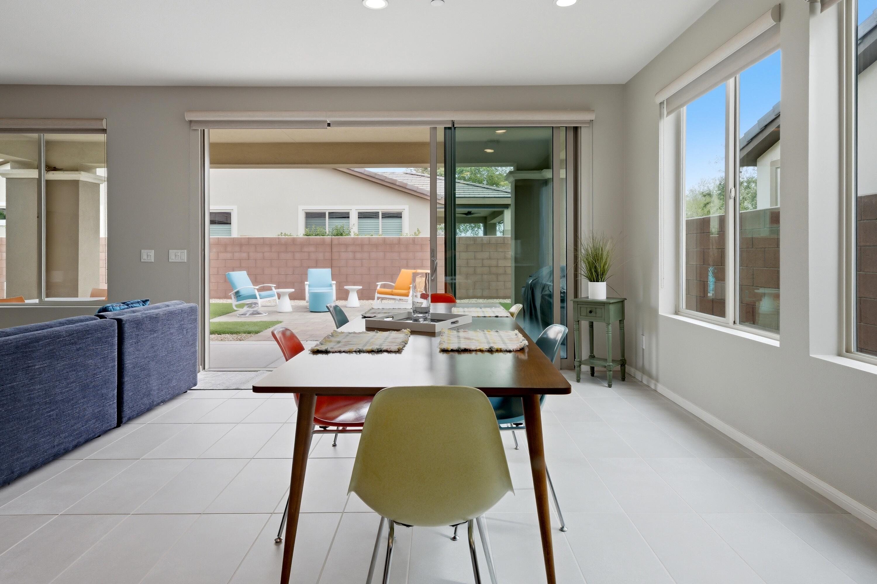51370 North Two Palms Way Indio, CA 92201 - Photo 10 of 37 a view of a dining room with furniture window and wooden floor