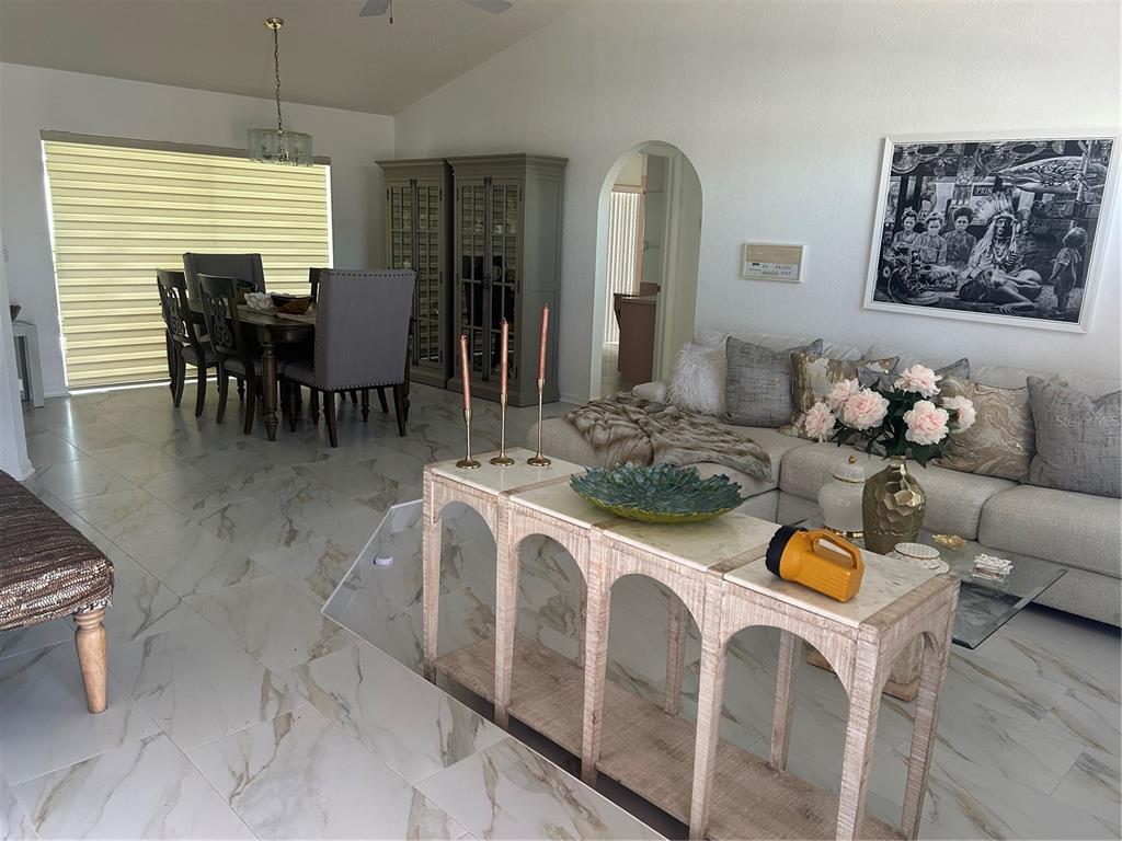 9376 Southern Belle Drive Weeki Wachee, FL 34613 - Photo 3 of 12 a dining room with furniture and window