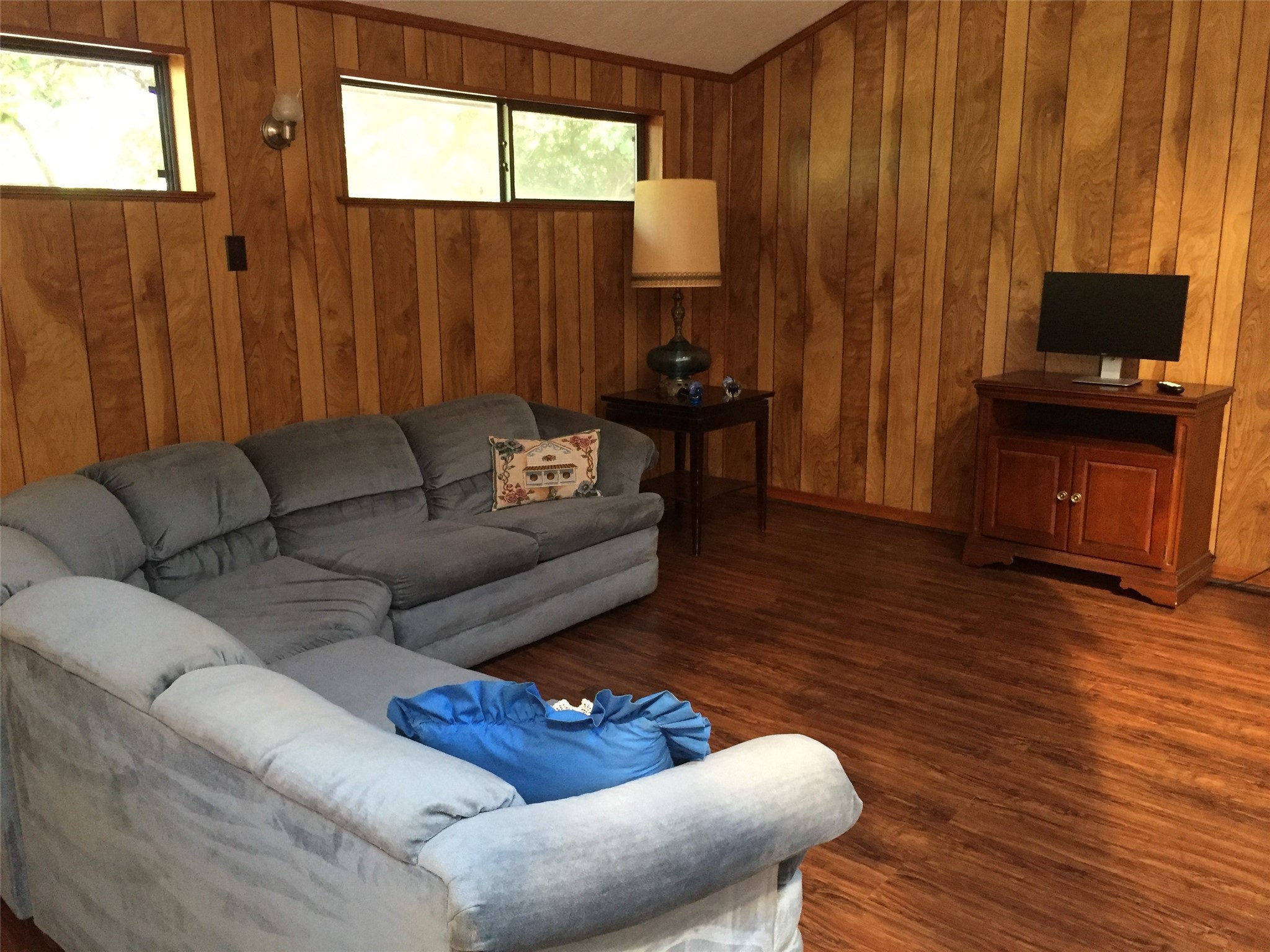 2604 Bois D Arc Drive Huntsville, TX 77320 - Photo 8 of 12 a living room with furniture and a flat screen tv