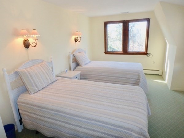 17 Otis Bassett Road West Tisbury, MA 02568 - Photo 17 of 28 a bedroom with a bed and a window
