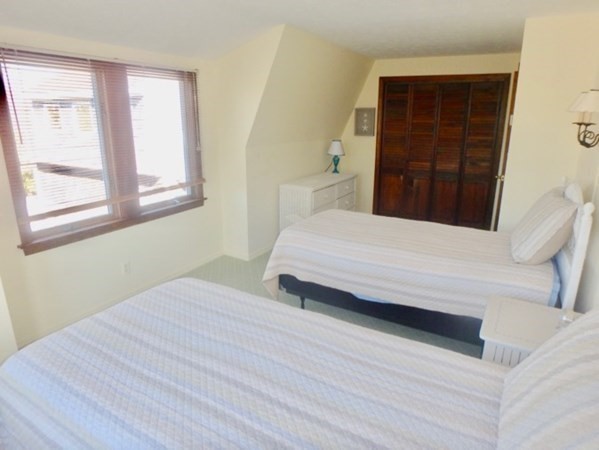 17 Otis Bassett Road West Tisbury, MA 02568 - Photo 19 of 28 a bedroom with a bed and a window