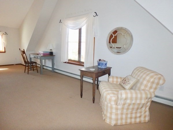 17 Otis Bassett Road West Tisbury, MA 02568 - Photo 25 of 28 a living room with furniture and a window