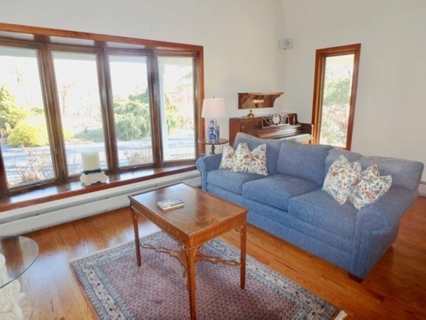 17 Otis Bassett Road West Tisbury, MA 02568 - Photo 7 of 28 a living room with furniture and a window