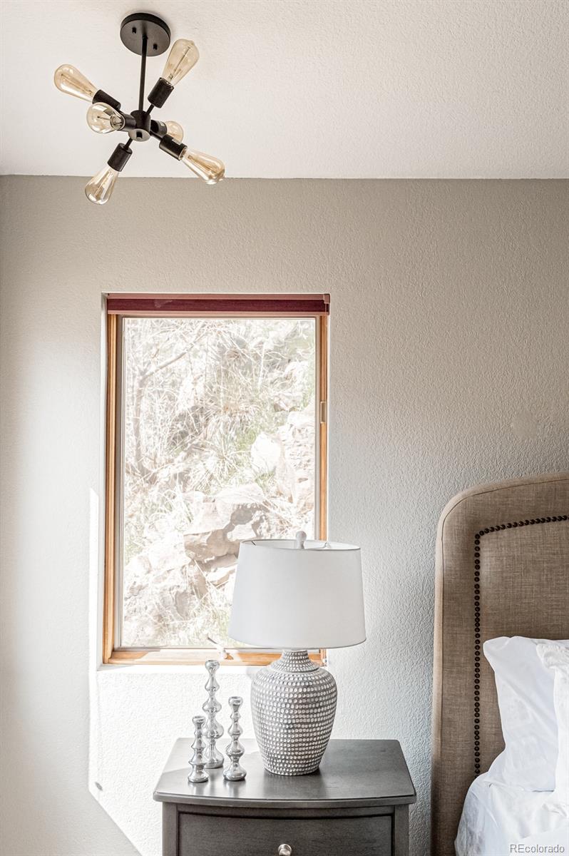 620 Cascade Drive Golden, CO 80403 - Photo 21 of 31 a living room with furniture and window