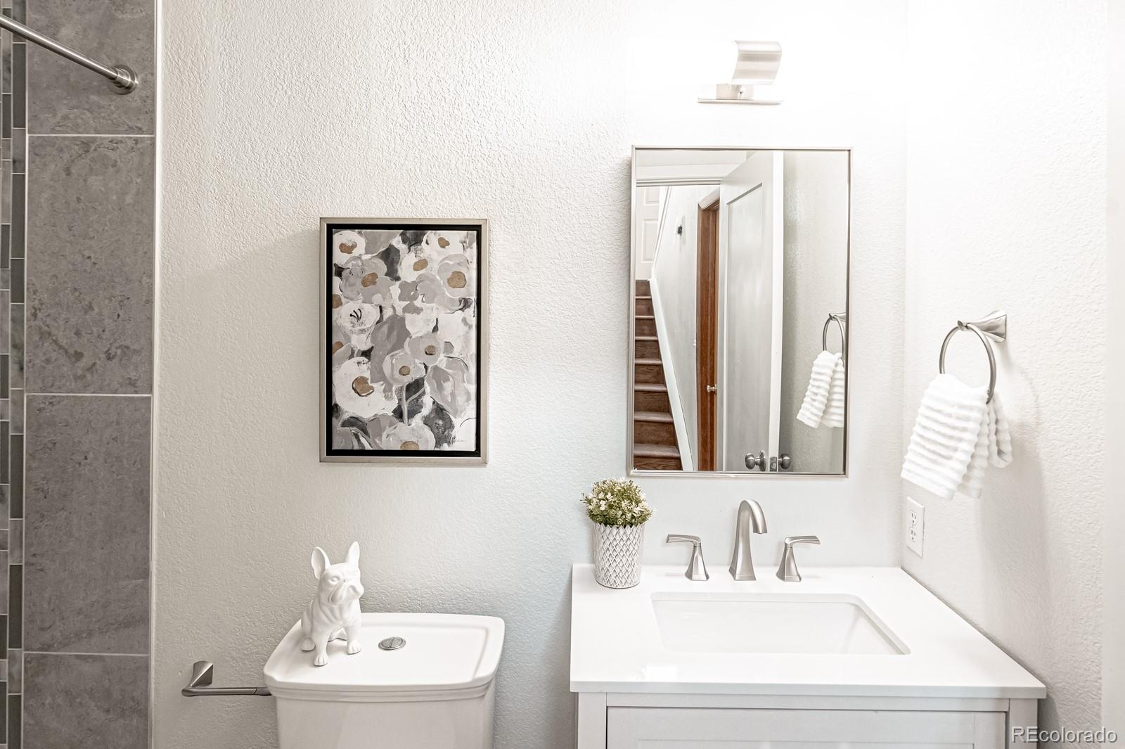 620 Cascade Drive Golden, CO 80403 - Photo 26 of 31 a bathroom with a sink and a mirror