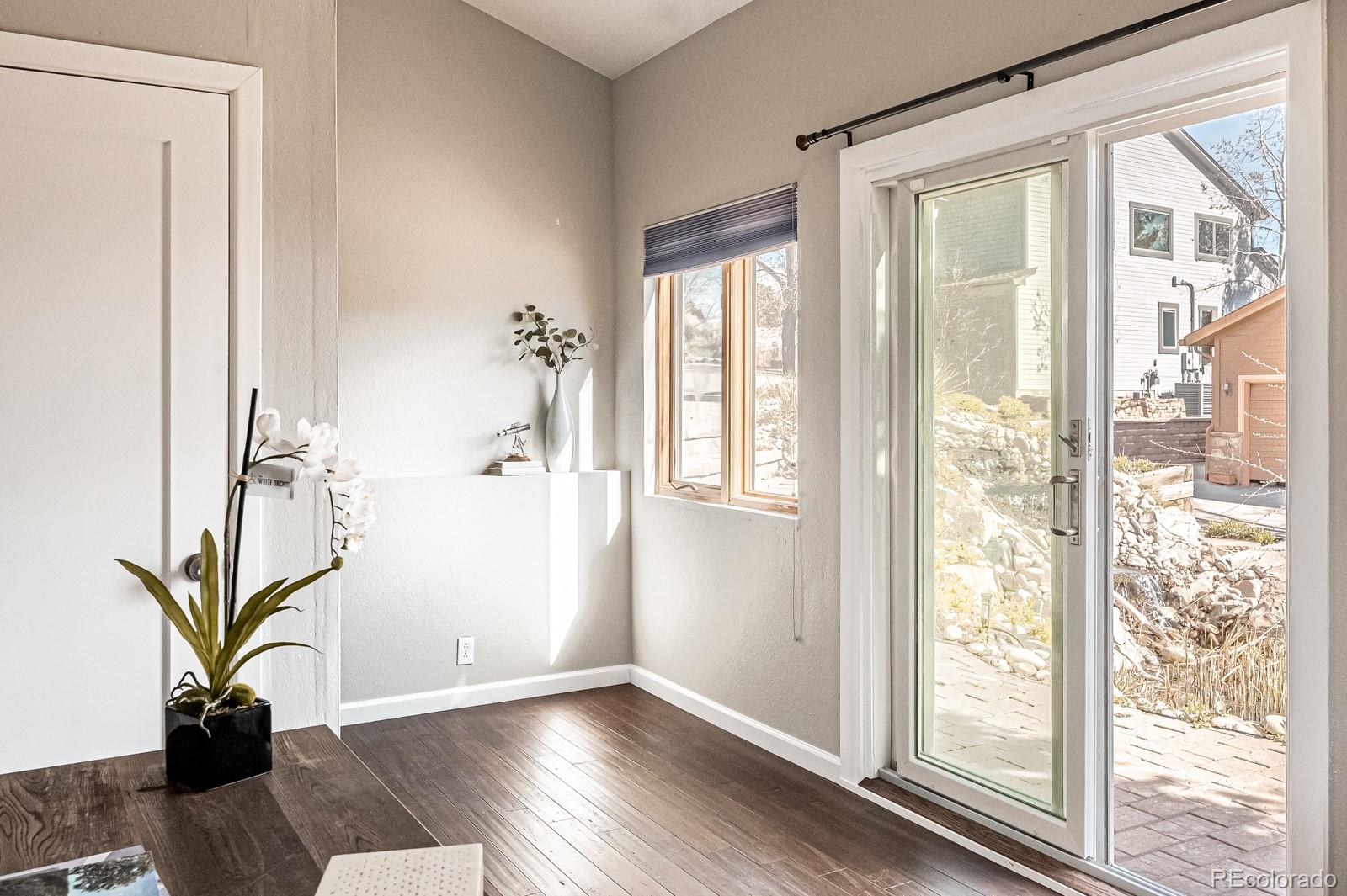 620 Cascade Drive Golden, CO 80403 - Photo 28 of 31 a view of an entryway with wooden floor