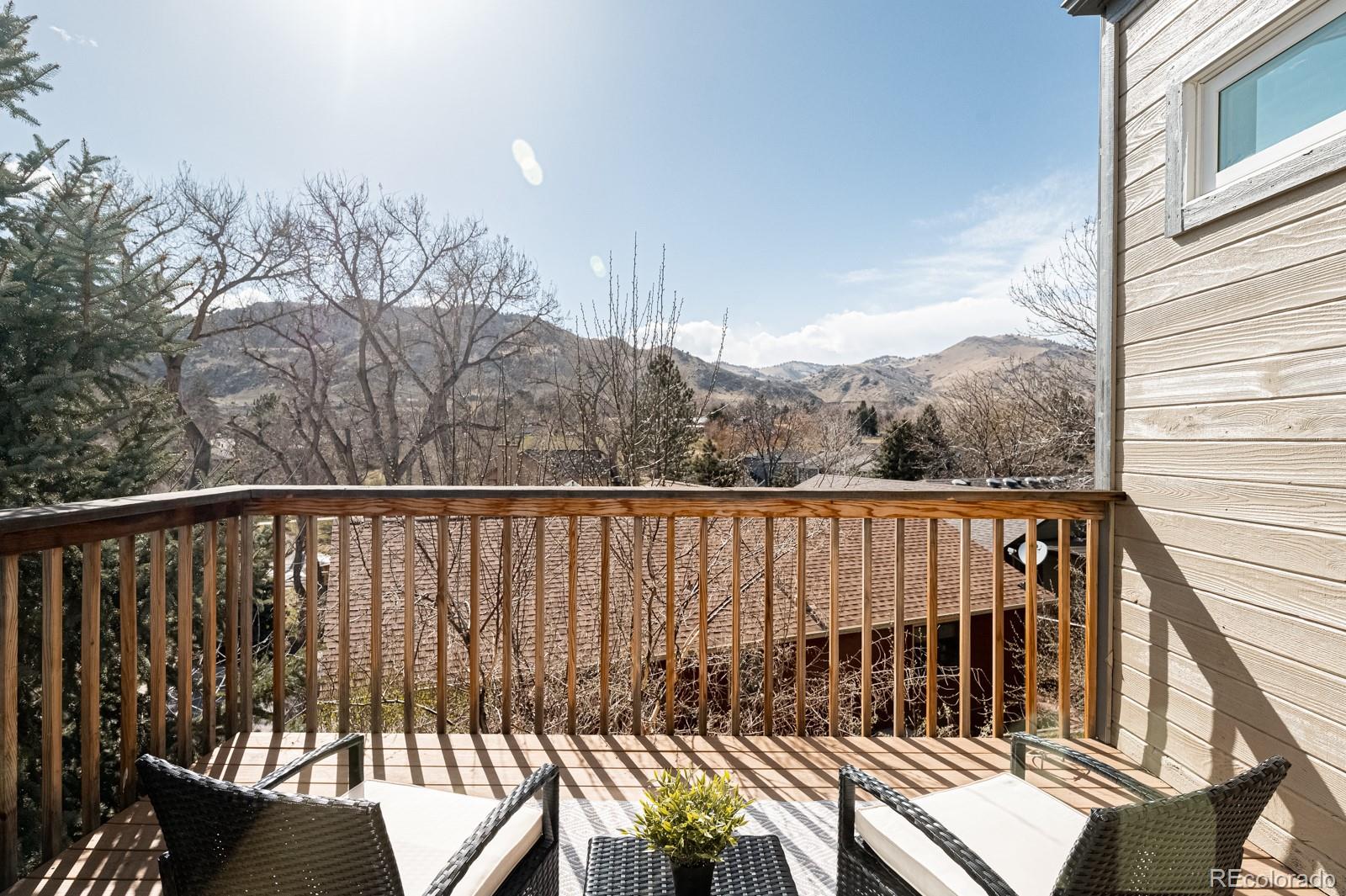 620 Cascade Drive Golden, CO 80403 - Photo 9 of 31 a view of balcony with wooden floor and fence